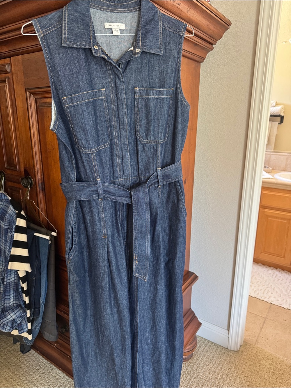 The Limited Sleeveless Denim Utility Jumpsuit in Dark Blue